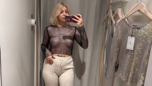 See Through Try On Haul Sheer Lingerie and Clothes Try On Haul At The Mall A sexy sheer mesh top on a blond girl.